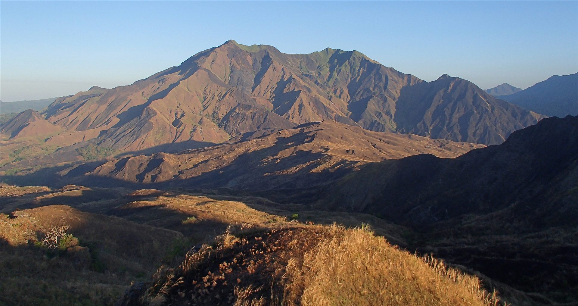Mt. Iglit's grassland ridges at golden hour, the tamaraw's last stronghold